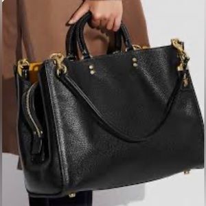 Coach Rogue 39 in regenerative leather black used once Beautiful